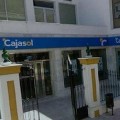 Muere una mujer en un tiroteo en un atraco a una oficina bancaria en San Juan de Aznalfarache
