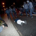 Antidisturbios golpeándonos frente al Museo del Prado