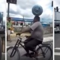 Un ciclista brasileño + Una bombona de gas + Un semáforo en rojo = Equilibrio imposible - Video