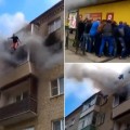 Familia rusa escapa de un edificio en llamas gracias a que sus vecinos los recogen cuando saltan desde el balcón [ENG]
