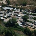 Absueltas más de sesenta familias acusadas de robar electricidad para sus chabolas en el poblado Las Salinas en Móstoles