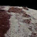 New horizons sobrevolando majestuosas montañas y llanuras heladas de Plutón (ENG)