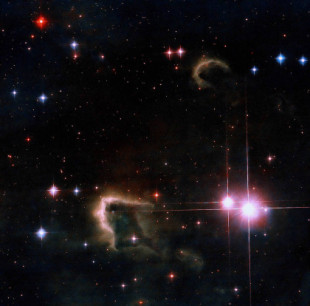 Nueva imagen del Hubble muestra envolturas oscuras donde se están formando nuevas estrellas [ENG]