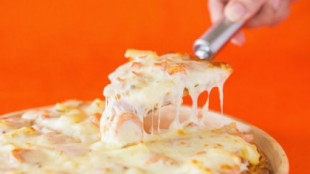 Cómo la pizza hawaiana, creada por un griego en Canadá, se convirtió en la más controvertida de la historia