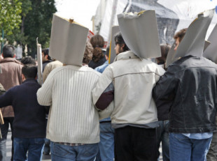 Una marcha de trabajadores pelotas pide mejores condiciones para sus jefes en el Día del Trabajo