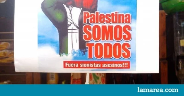 El Ayuntamiento de València retira dos carteles de apoyo a Palestina en un mercado municipal