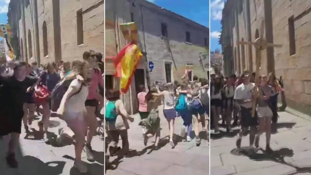 Carreras, gritos y banderas: julio arranca de nuevo con la entrada descontrolada de peregrinos en Santiago